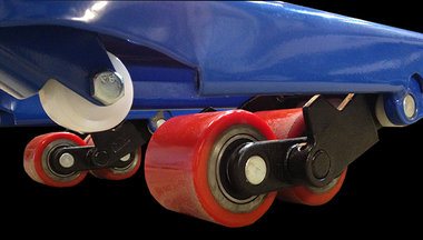 Tandem polyurethane load rollers with guide rollers 